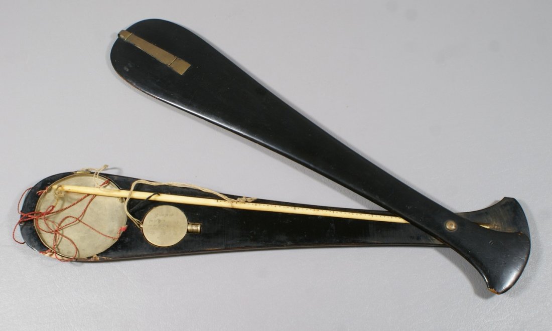Asian beam scale, c/o bone rod suspending a metal pan o: Asian beam scale, c/o bone rod suspending a metal pan on 4 threads, and a movable counterweight with landscape engraving & calligraphy, the rod with a calibrated scale, all contained in a black lacque
