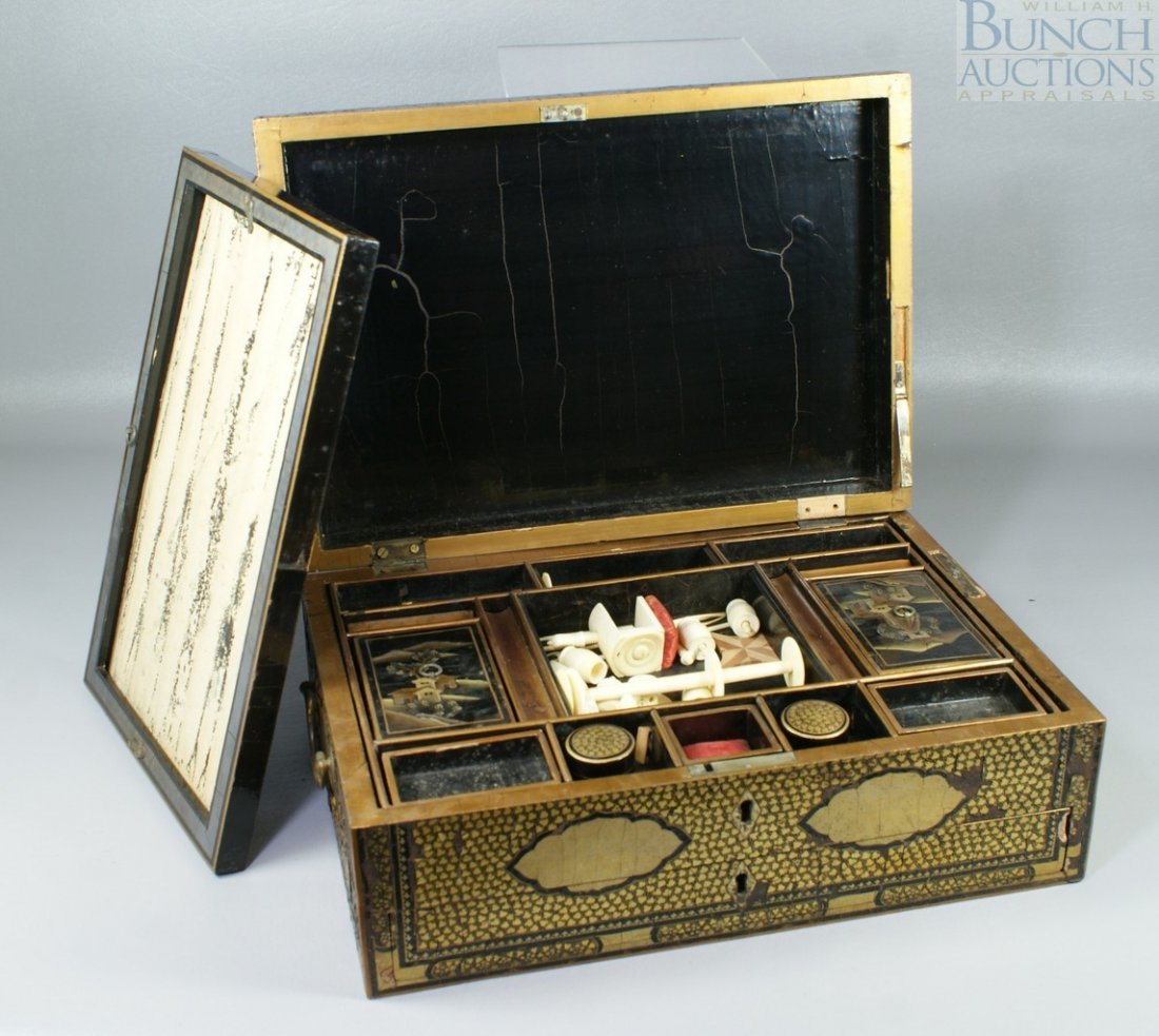 Japanese lacquered box with fitted interior, a number o: Japanese lacquered box with fitted interior, a number of ivory accessories, losses to the lacquer13 3/8" w, 4 3/4" h