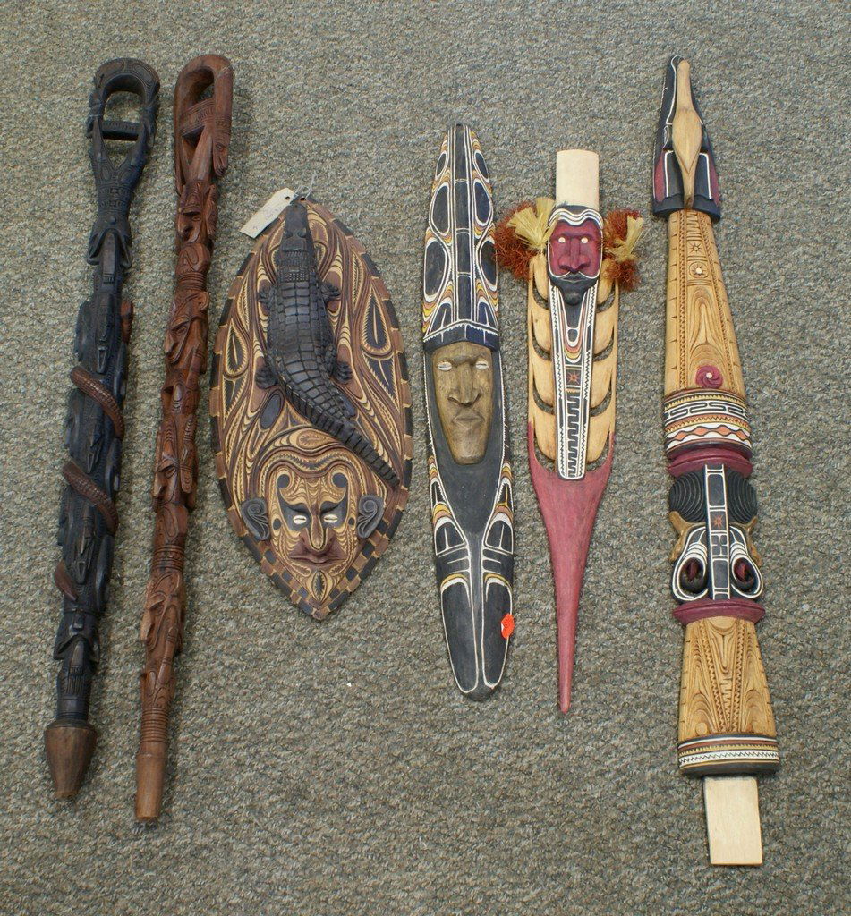 (6) Carved wood items including 2 walking sticks, 4 car: (6) Carved wood items including 2 walking sticks, 4 carvings (one Sepik River), tallest 39"
