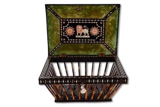 Matara Sri Lankan Inlaid Porcupine Quill Box: Matara Sri Lankan Inlaid Porcupine Quill Box, bone inlaid ebonized wood formed box with porcupine quill surround and inlaid lid, the underside with inlaid and red inked full figure of a lion, reading