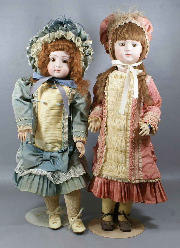 2 Reproduction French Dolls, both from different artist: 2 Reproduction French Dolls, both from different artists trying to represent "Jumeau Triste" larger doll in rose 27"