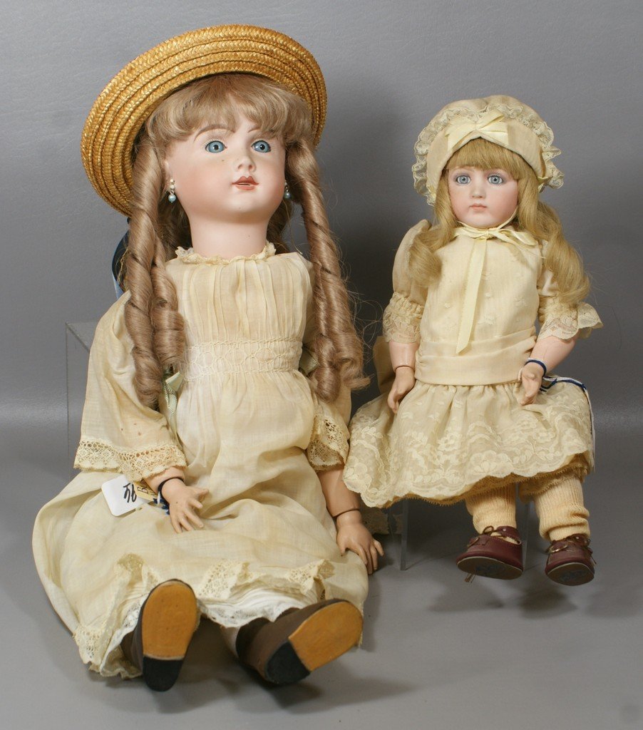 2 Reproduction French Dolls, larger a replica of an ope: 2 Reproduction French Dolls, larger a replica of an open mouth Steiner, 24", and the smaller a Jumeau