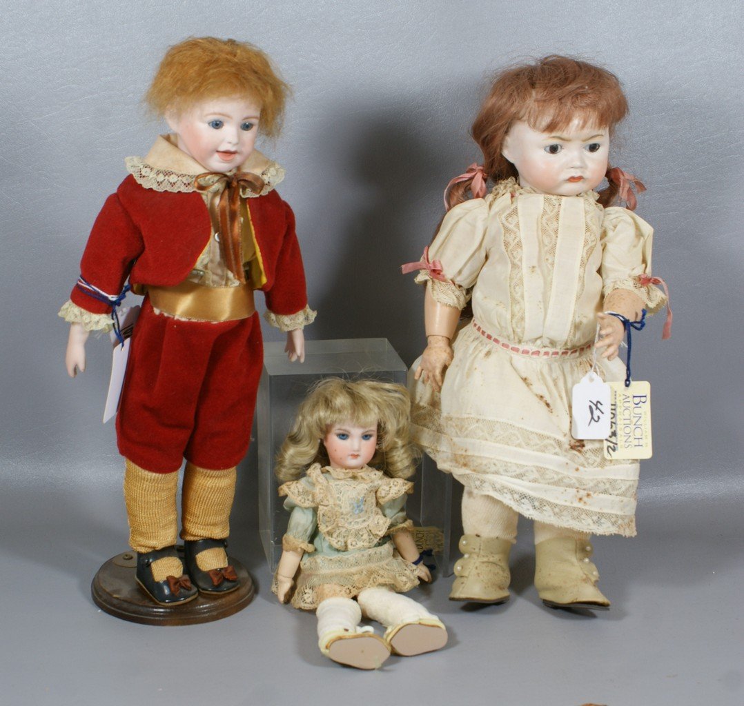 2 Reproduction French Bisque Dolls, larger a replica of: 2 Reproduction French Bisque Dolls, larger a replica of "SFBJ 252", and the smaller is most likely a reproduction Jumeau, tallest 15"