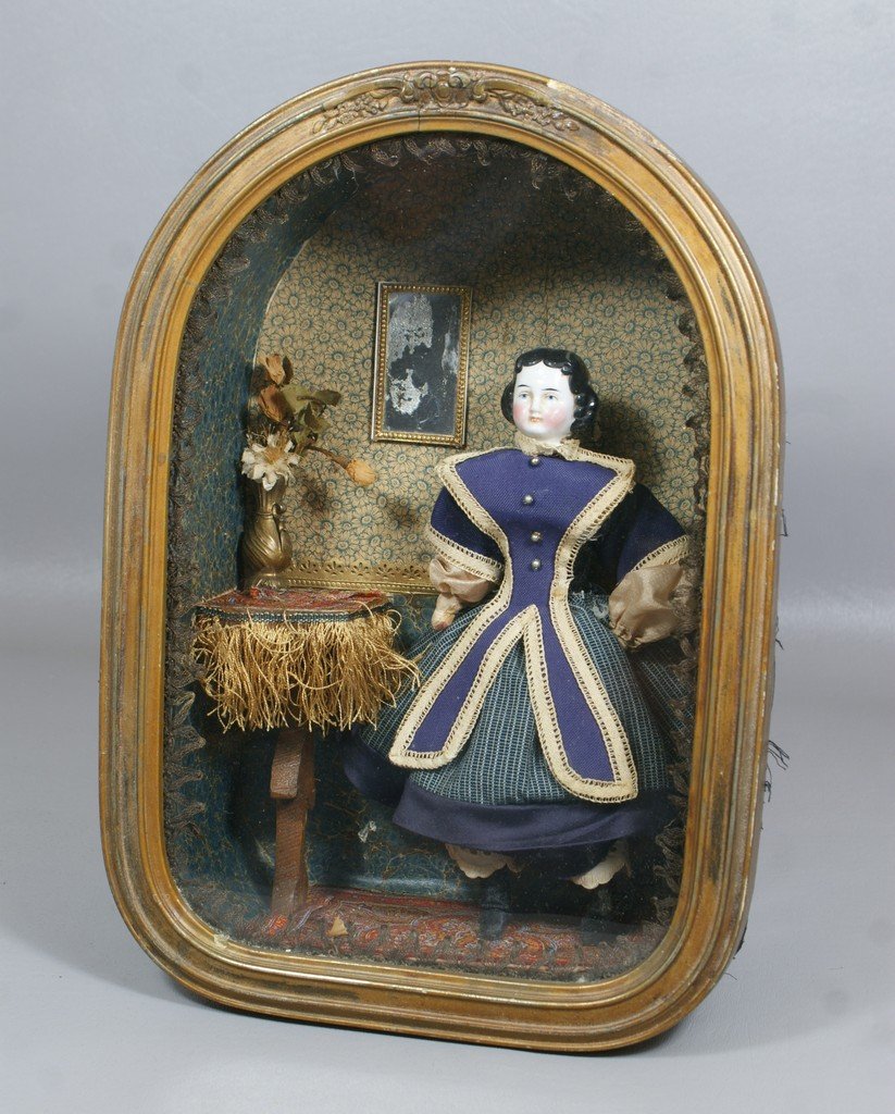 Attractive 1860s Era Vignette Featuring a Glazed China : Attractive 1860s Era Vignette Featuring a Glazed China Head doll in a dome topped shadow box with period wall paper, mirror, corner table and vase with flowers, she wears an authentic period costume, 