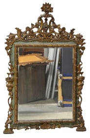 Rococo style ornately carved mirror