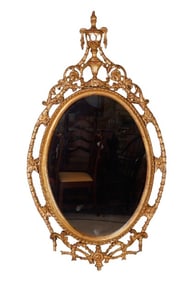 French Rococo oval gilt gesso mirror
