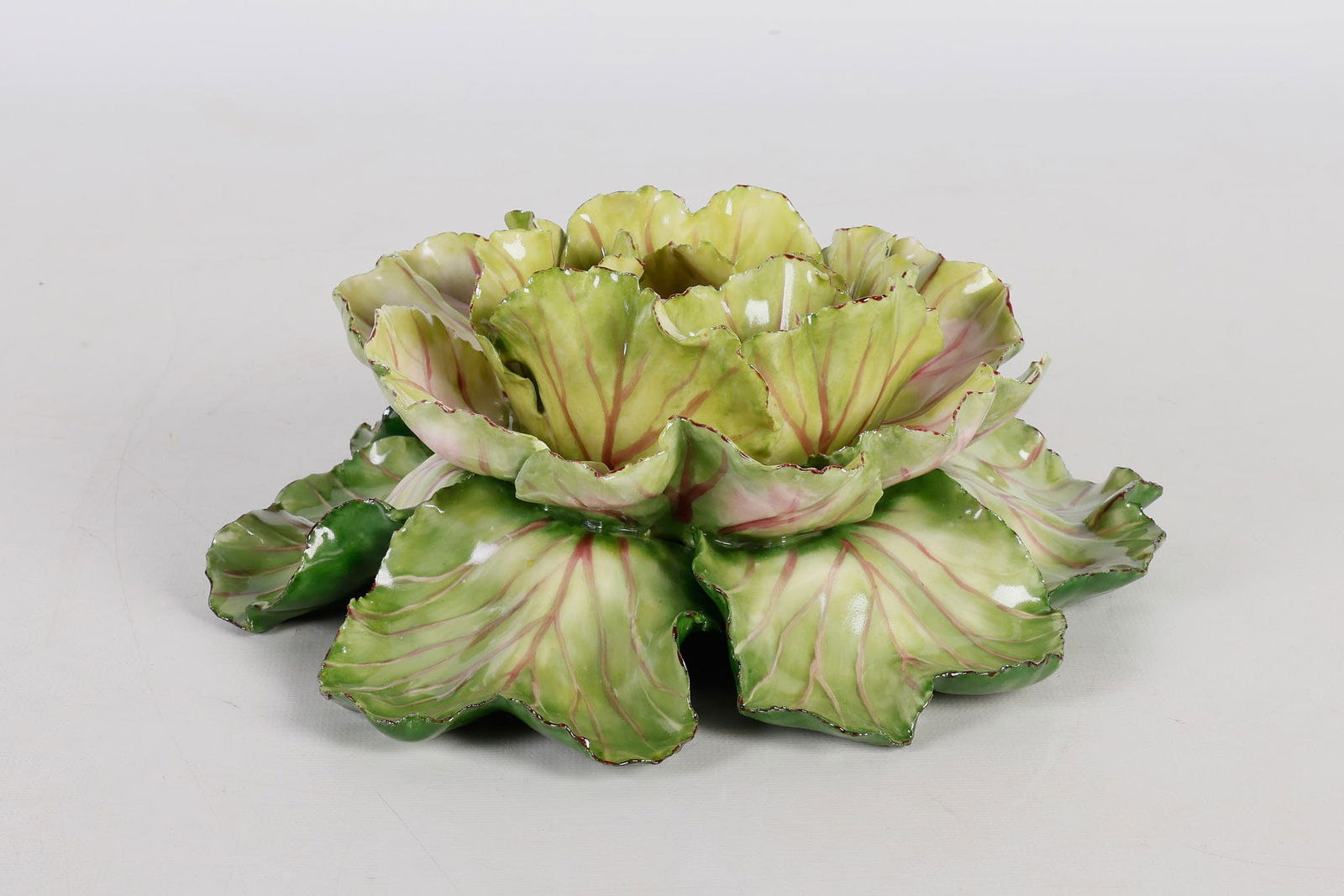 Katherine Houston Porcelain Cabbage: Katherine Houston Porcelain Cabbage, purple and green glazed and painted porcelain cabbage, signed at underside, 8-1/2" diam x 3-7/8"H, (2) fleabites, otherwise excellent condition