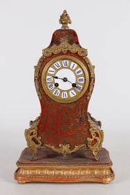 A French Louis XV Style Inlaid Mantel Clock