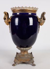 A cobalt glazed French aesthetic movement Sevres style earthenware jardiniere