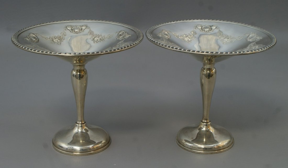 Pr weighted sterling silver compotes, embossed shell & : Pr weighted sterling silver compotes, embossed shell & floral design, 7" d, 6 1/2" h, some twisting