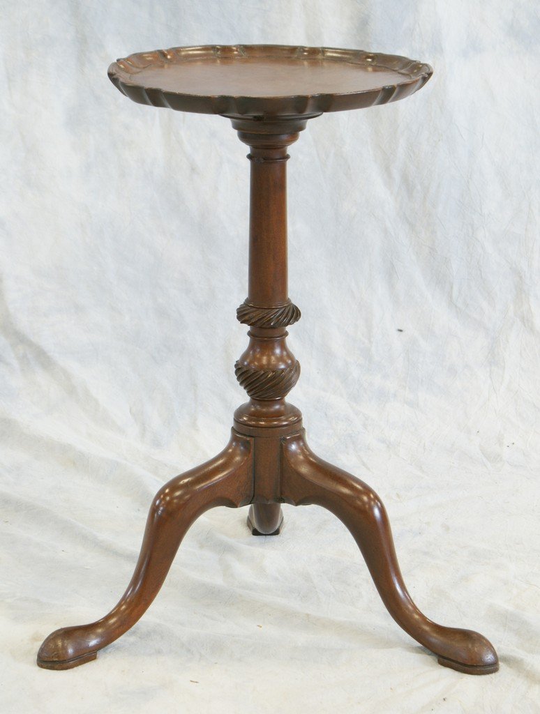 Georgian carved mahogany candle stand, pie crust edge s: Georgian carved mahogany candle stand, pie crust edge single board top over stem with spiral reeded carving, raised on tripod base with cabriole legs, 12"d, 3/16" of shrinkage, 21 1/2"h, 18th century