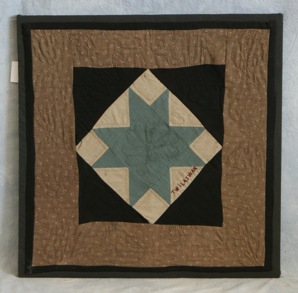 Lancaster County, Pennsylvania patchwork crib quilt, 19: Lancaster County, Pennsylvania patchwork crib quilt, 19th c., with central star variant, inscribed Twila. Swan, 23 1/2'' x 23 1/2''.