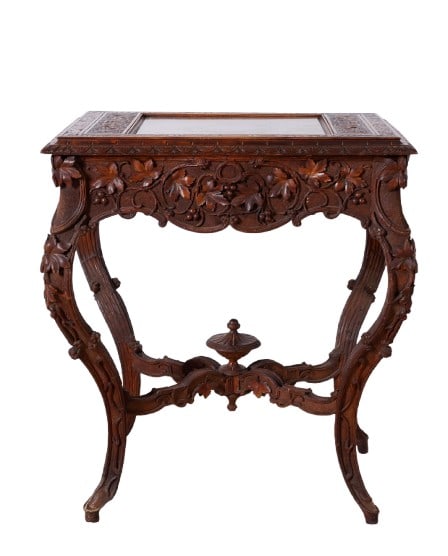 Victorian Carved Wood Games Table: Victorian carved wood games table, rectangular inlaid board surface, under glass, in carved surround, ornately carved frieze, faux bois carved base with x stretcher, 25â€? x 20â€? x 29-1/2
