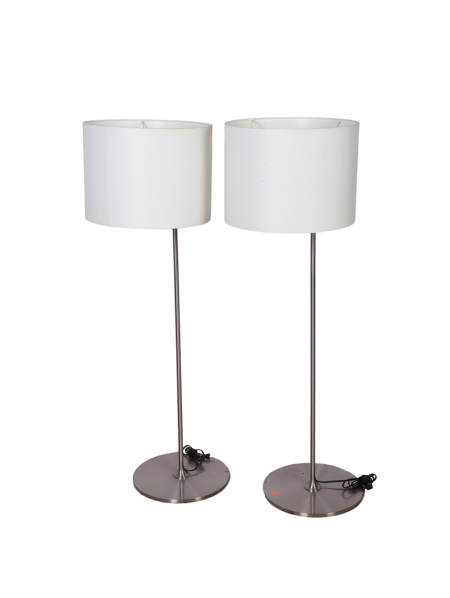 Pair of MCM Style Floor Lamps: Pair of MCM style floor lamps, slim line style poles, w/large round bases, brushed metal, two fixtures, white linen shades, 58"H x 23"W x 18"D