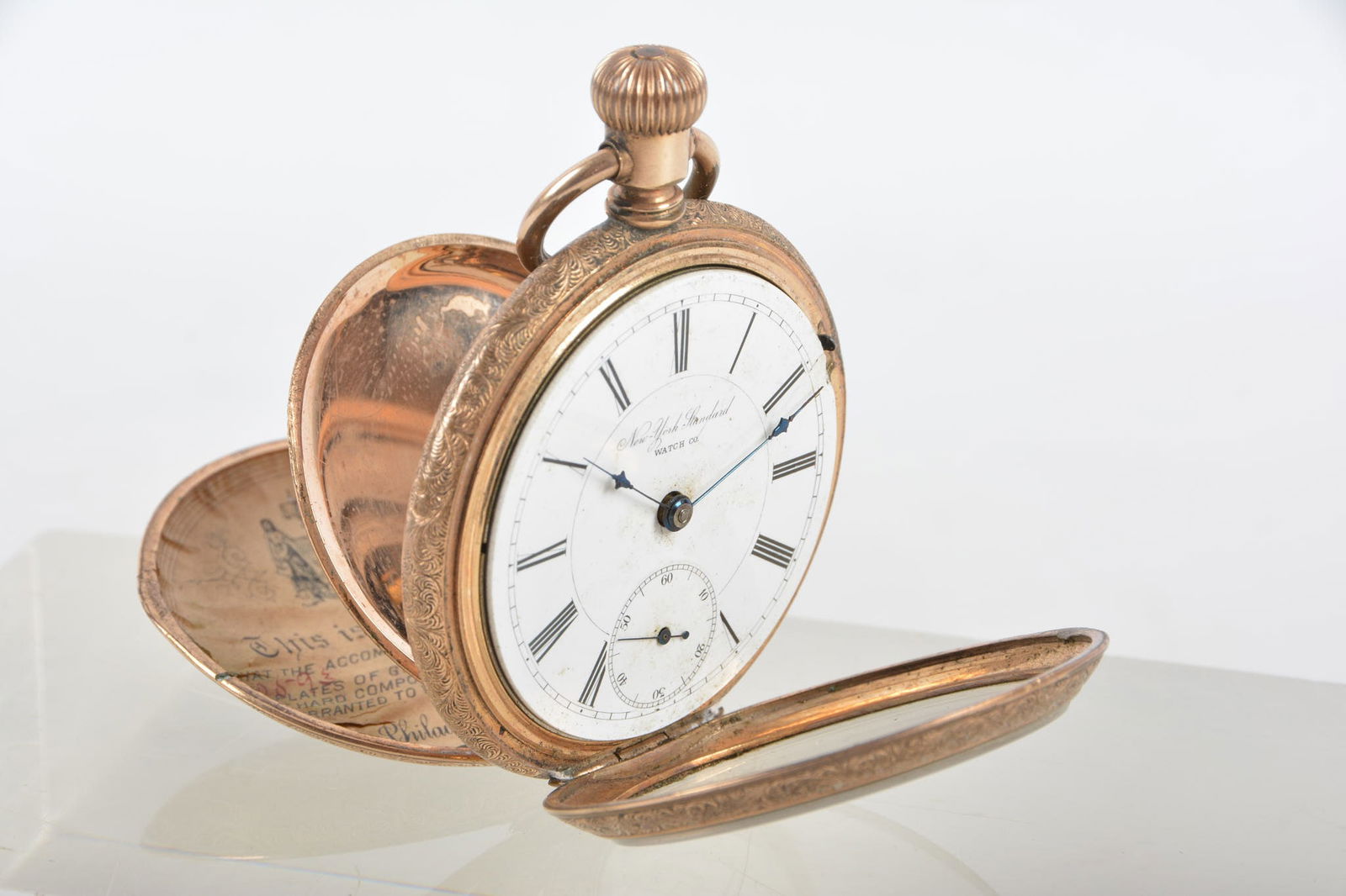 New York Standard Open Face Pocket Watch.: New York Standard Open Face Pocket Watch. dating to 1890s, with nickel movement bears serial 253154, 18s, 7 jewels, grade 35, model 6, housed in chased gold filled case with stag adorning the back by