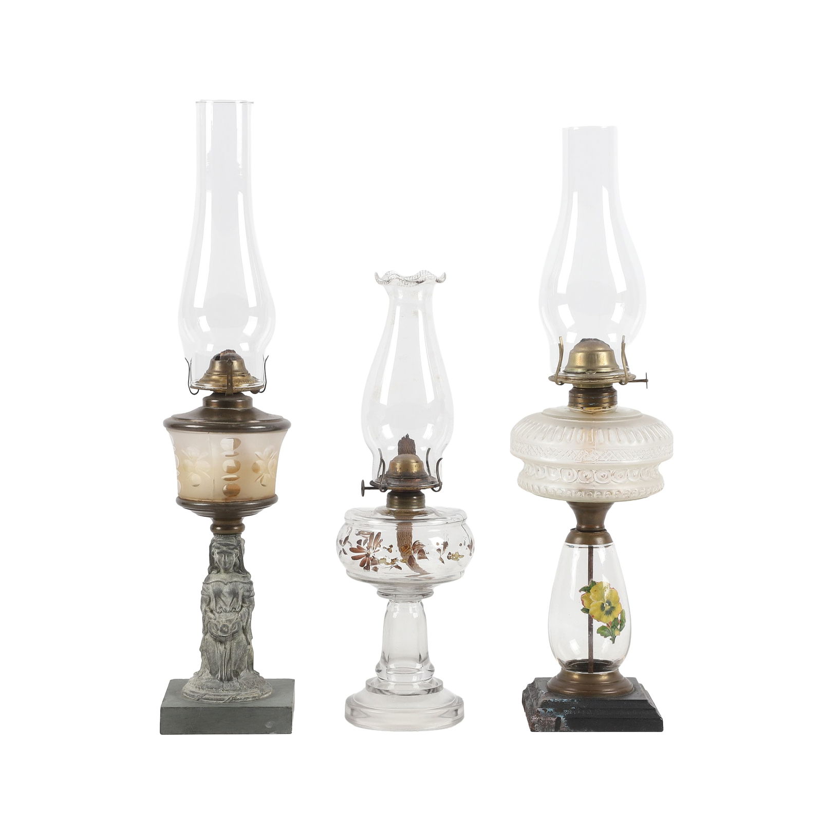 (3) Victorian Oil Lamps: (3) Victorian Oil Lamps to include a frosted glass font figural oil lamp, cast Iron figural stem depicts woman kneeling with a slate base, Pressed Glass Font Oil Lamp on a floral decorated glass and