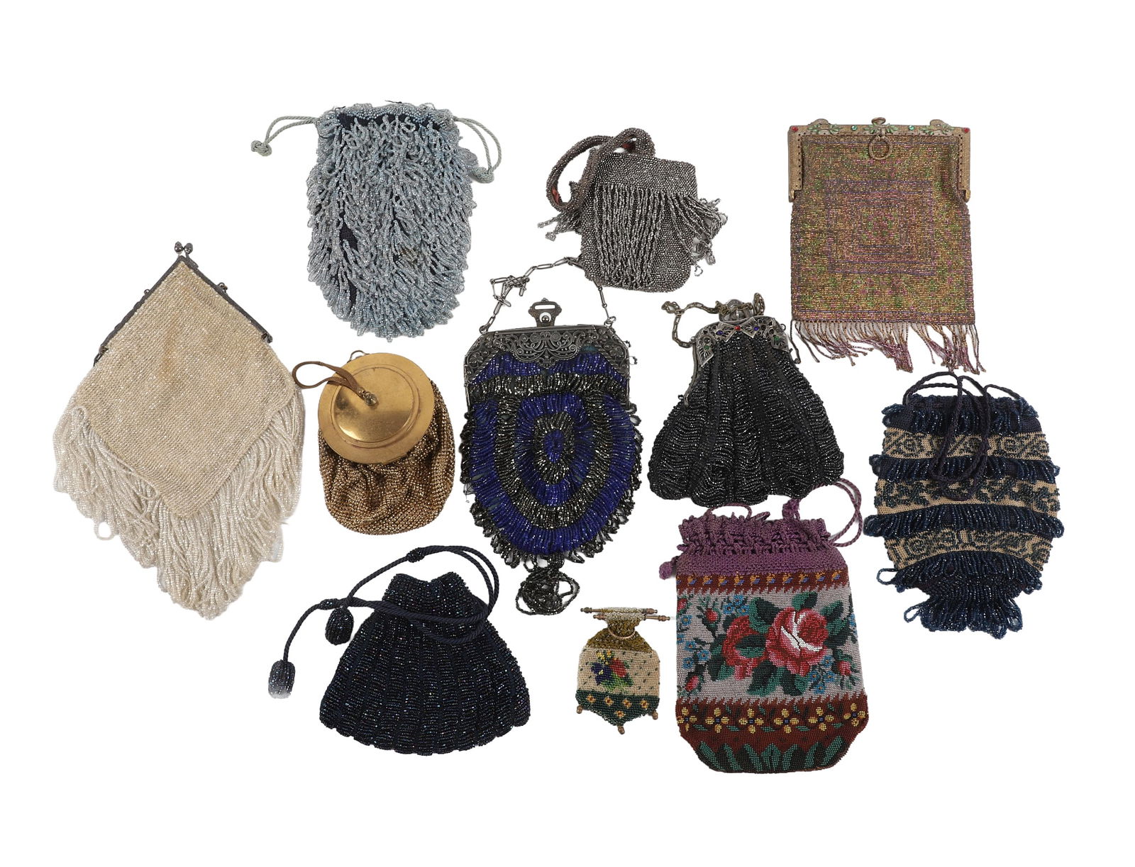 A Collection of Early 20th C Ladies Purses: A Collection of Early 20th C Ladies Purses to include a silver tone steel cut beaded fringe purse, some losses to beads, 8 7/8"L, a black glass beaded knit purse with silver tone faux gem set