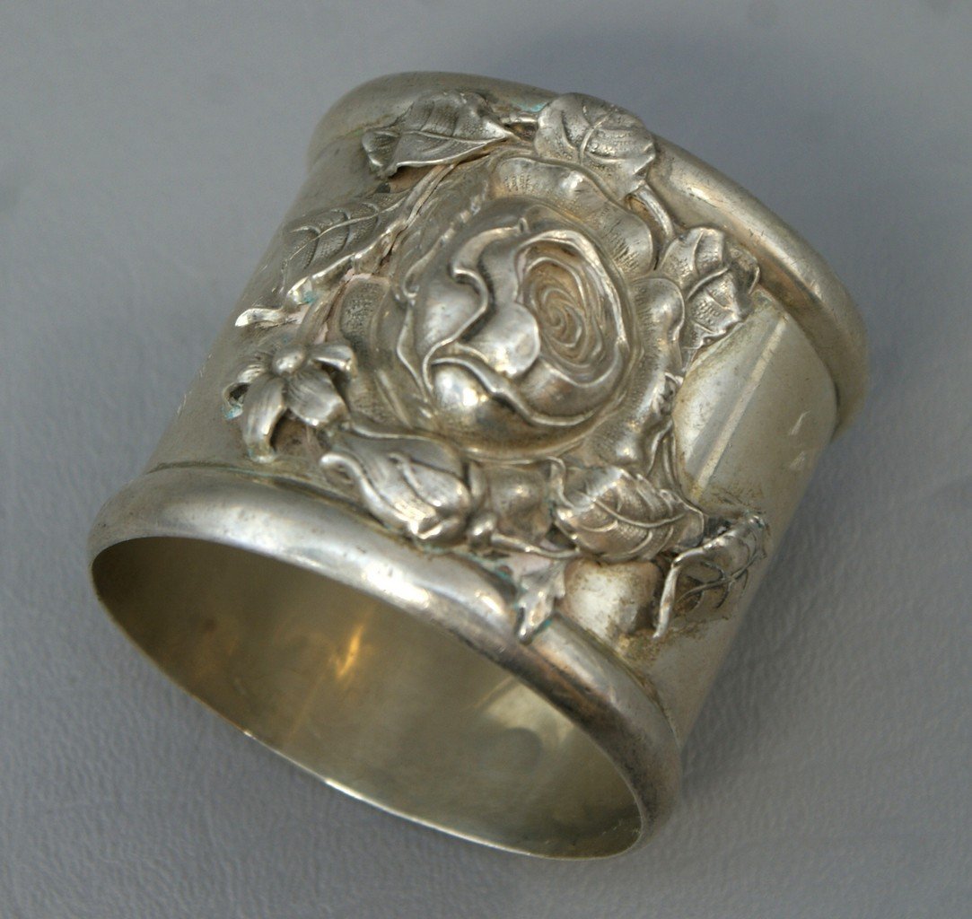Whiting sterling silver napkin ring with raised rose: Whiting sterling silver napkin ring with raised rose design, 1.40 TO, 2" d