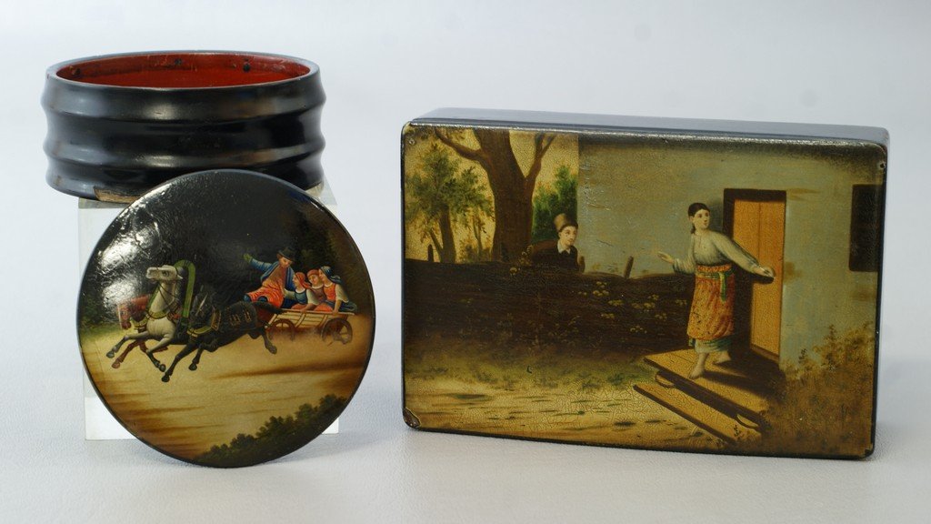 (2) lacquered paper mache Russian boxes, 3 1/2" round: (2) lacquered paper mache Russian boxes, 3 1/2" round with horse drawn carriage scene, 5 1/2" w rectangular, young couple outside house, chip on corner of lid, each signed inside lid