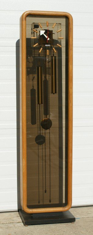 Howard Miller Mid Century Modern Standing Clock, 56" h,: Howard Miller Mid Century Modern Standing Clock, 56" h, 14" w, 10" d