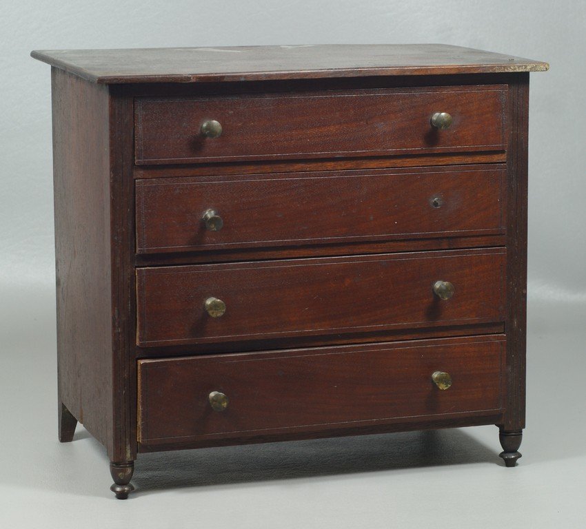 Miniature mahogany Sheraton 4 drawer chest, scratch: Miniature mahogany Sheraton 4 drawer chest, scratch beaded stiles and drawers, turned front feet, 10 1/8" w, 9 3/4" h, American, early 19th c