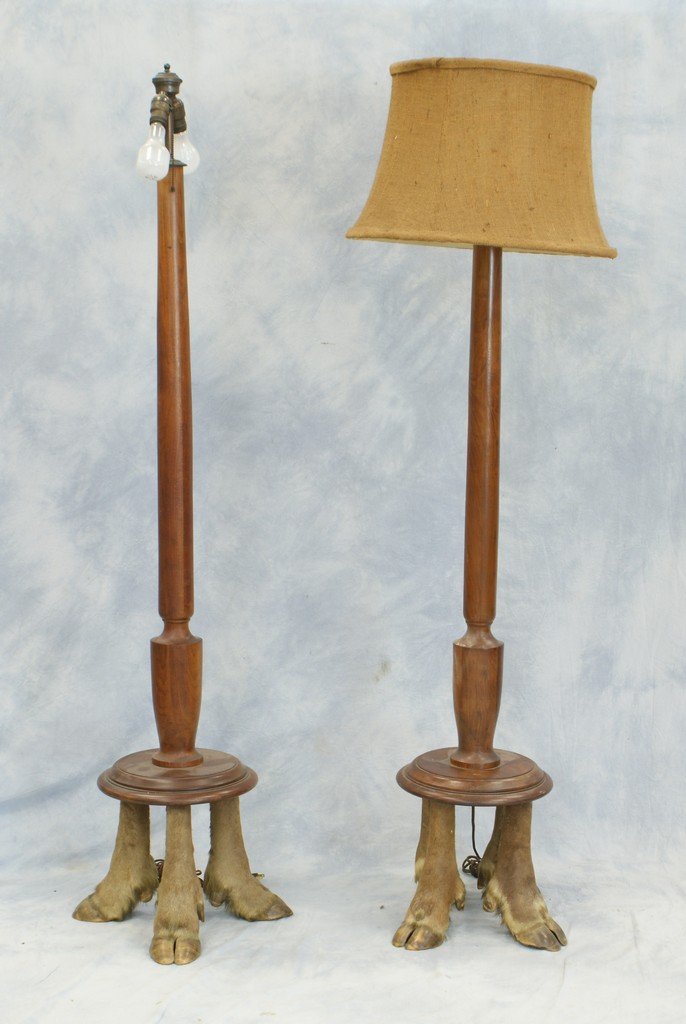 Pr mahogany floor lamps with hoof foot bases. Probably: Pr mahogany floor lamps with hoof foot bases. Probably elk or moose, 67" high