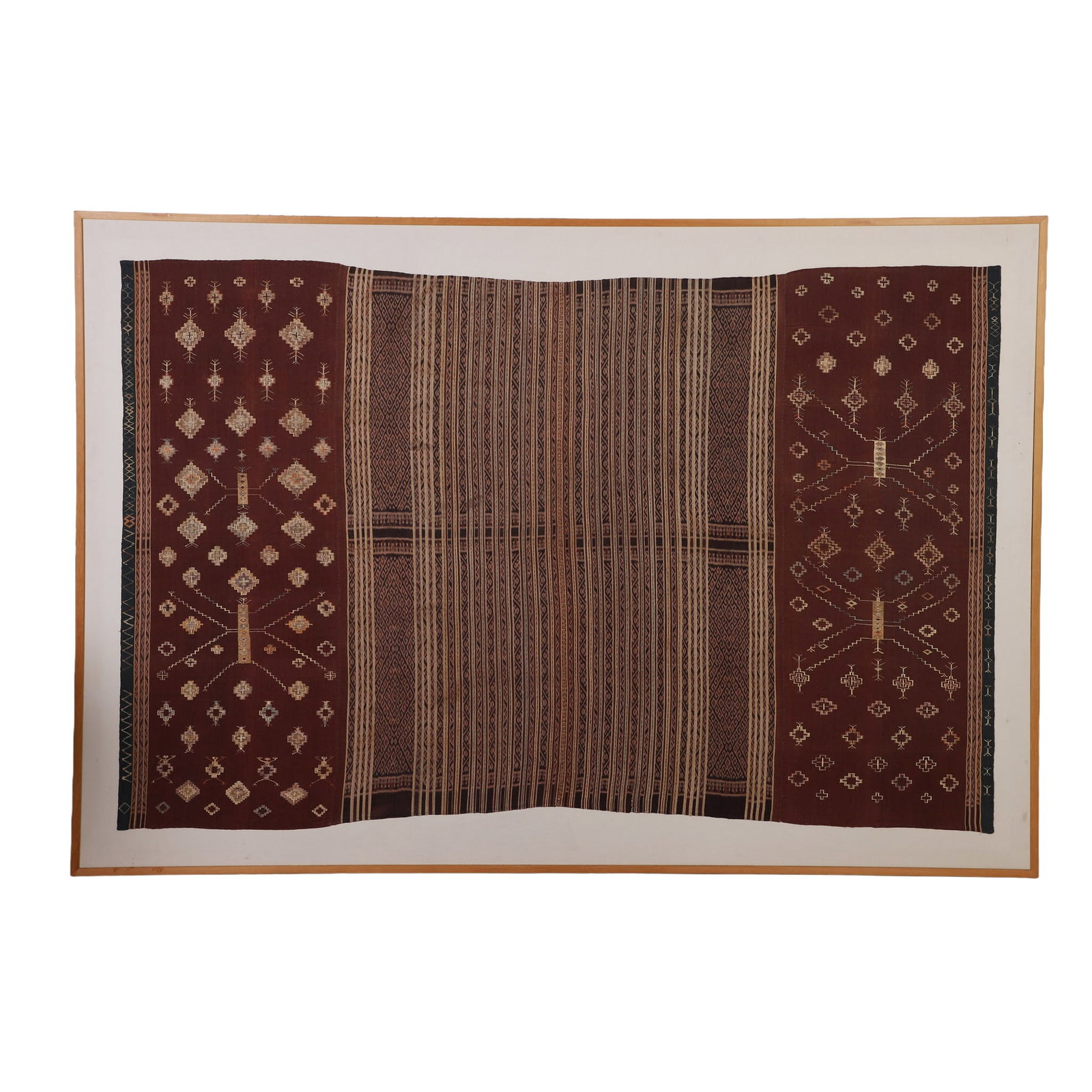 Framed Indonesian Flores Ikat Woman's garment: Framed Indonesian Flores Ikat Woman's garment, Belu region, Timor, Indonesia, ca. 1920. Image Height: 48 in, Image Width: 74 in, Framed Height: 56 in, Framed Width: 81 1/2 in