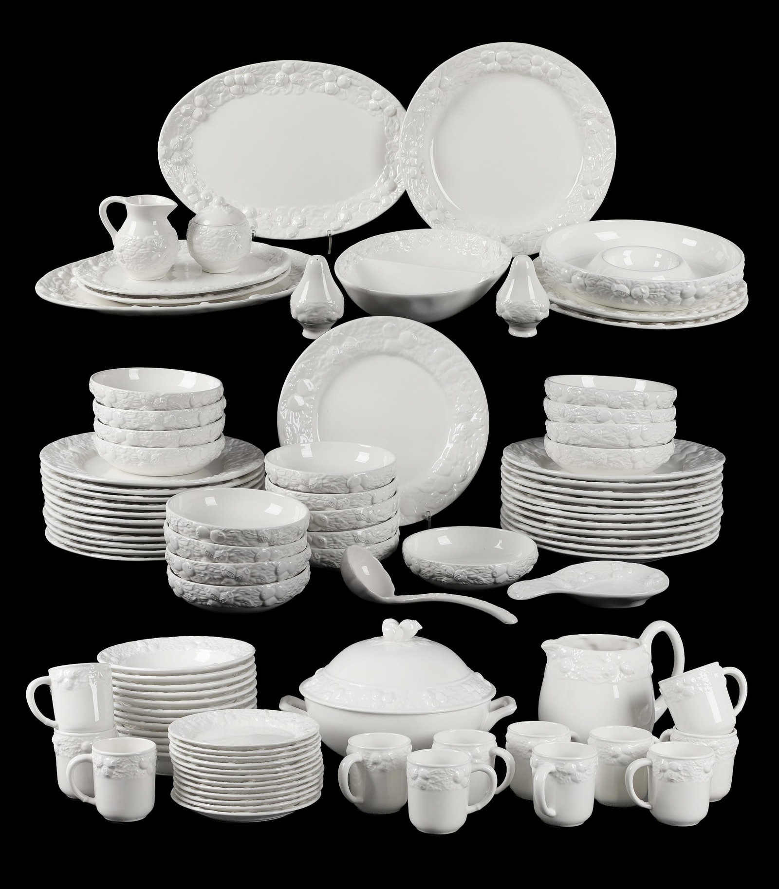 (99) Italian Este Ceramiche All-White Service: (99) Italian Este Ceramiche All-White Service (99) piece Este Ceramiche all-white dinnerware with embossed leaf & berry motif at the rim. Includes: (23) 12" dinner plates, (18) 7" soup bowls, (12) 8 1