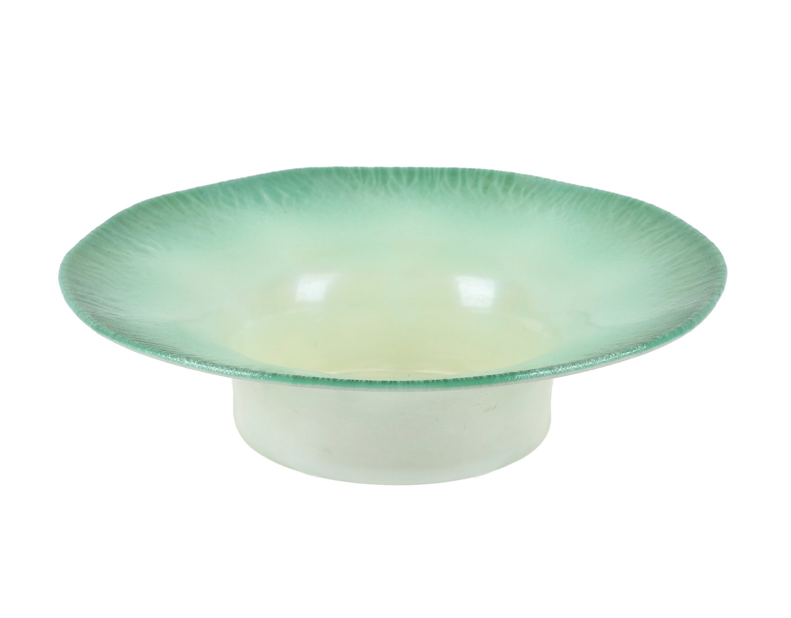 L.C. Tiffany Favrile Pastel Green Glass Bowl: L.C. Tiffany Favrile Pastel Green Glass Bowl L.C. Tiffany favrile art glass pastel green and opalescent centerpiece bowl. Stretched rim with depressed center, root-like edge design, etched makers mark