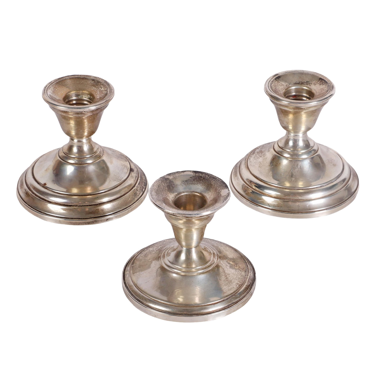 (3) International Weighted 'Berkeley' Sterling Candlesticks: (3) International Weighted 'Berkeley' Sterling Candlesticks (3) Sterling silver candlesticks featuring a pair of International 'Berkeley' weighted sterling silver candlesticks + (1) extra, unmarked. S