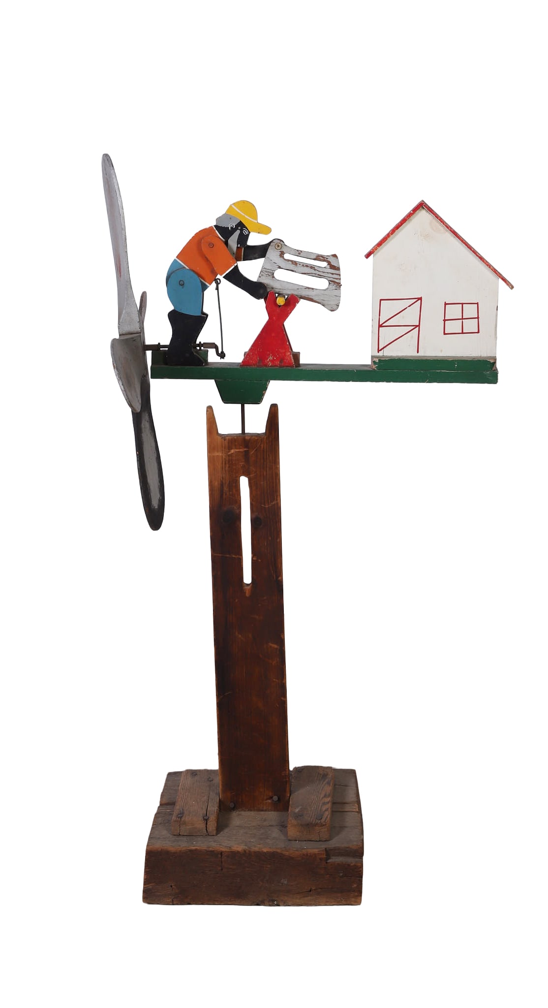 Lumberjack Sawing Wood Whirligig: Lumberjack Sawing Wood Whirligig Lumberjack Sawing Wood Whirligig, hand carved and painted wooden kinetic folk art sculpture depicting a man sawing a log, on stand, 46"H x 22"W x 24"D