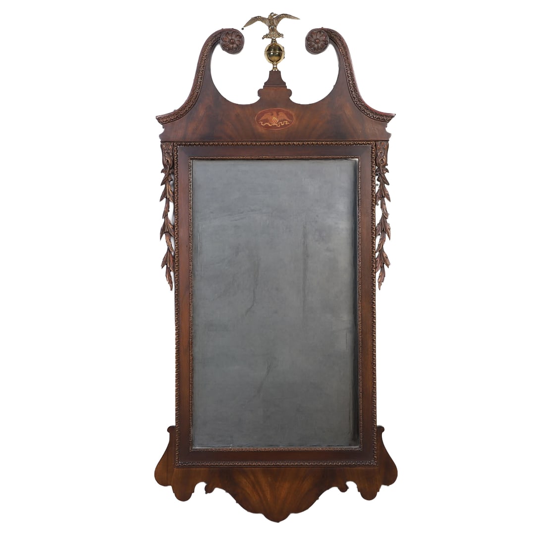Chippendale Style Federal Eagle Looking Glass: Chippendale Style Federal Eagle Looking Glass A mirror with broken pediment arch top with inlaid federal eagle and featuring a casr brass eagle finial. 50" h x 24" W