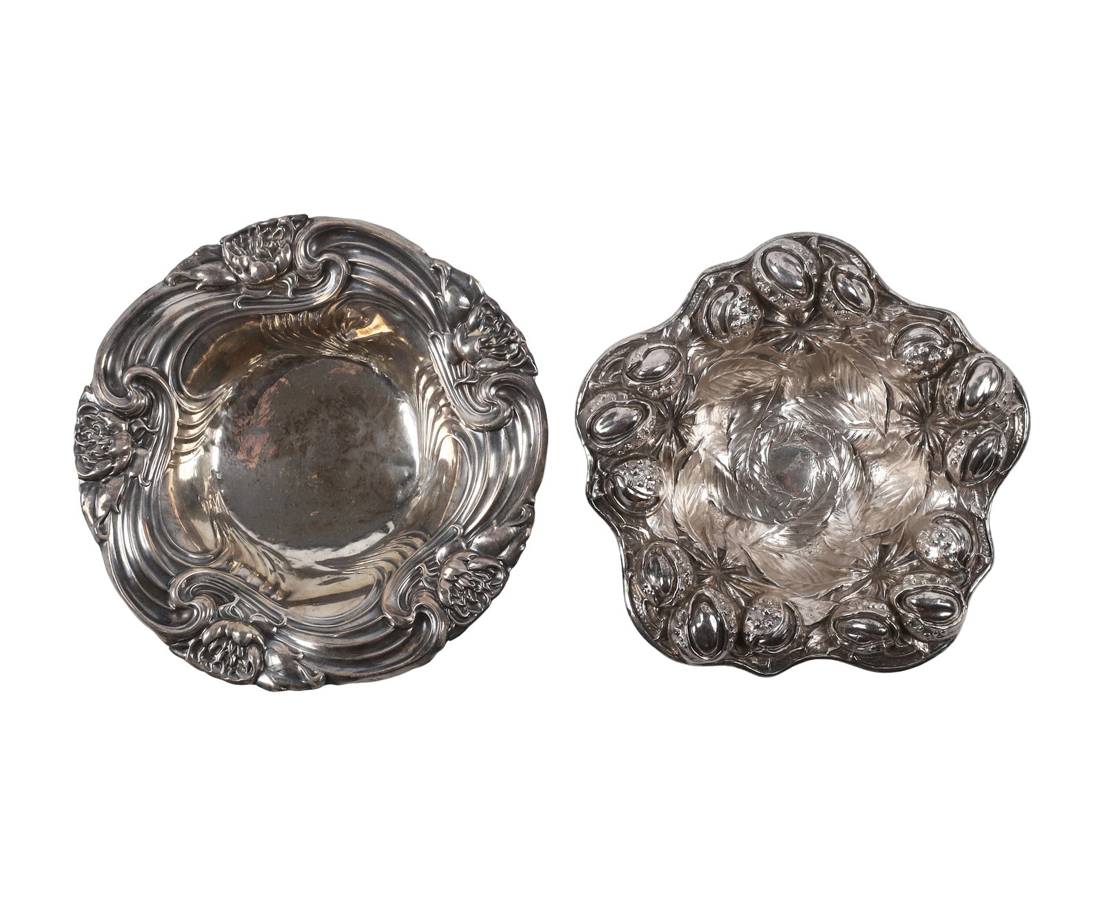 (2) Sterling Silver Nut Dishes: (2) Sterling Silver Nut Dishes (2) Sterling silver nut dishes including a W.B. Kerr & Co dish decorated with nuts & leaves (3.170 ozt) and an Art Nouveau dish with raised peony flowers (2.150 ozt). To