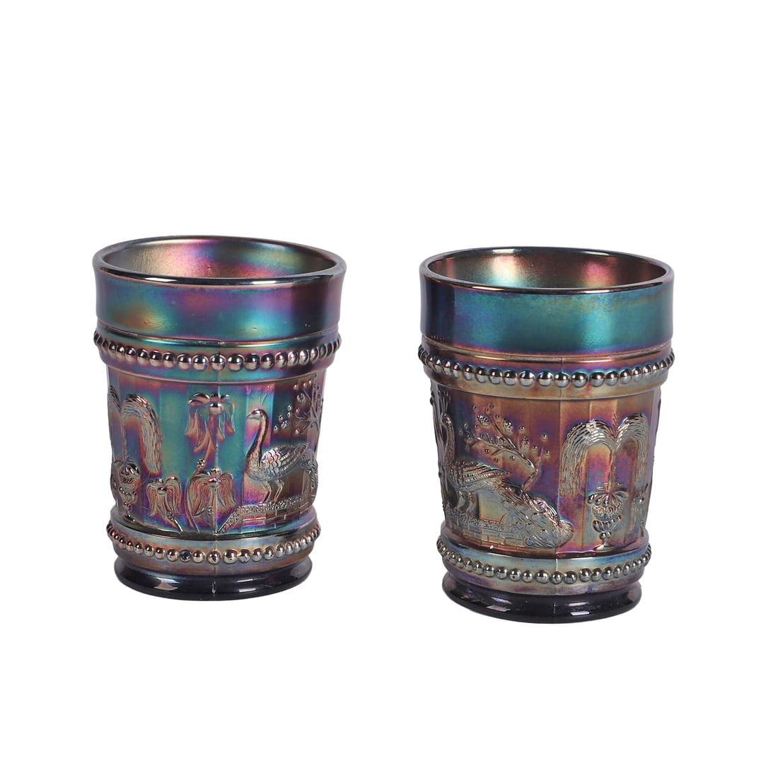 (2) Antique Carnival Glass Peacock Tumblers: (2) Antique Carnival Glass Peacock Tumblers Pair of antique carnival glass 'Peacock at the Fountain' tumblers, each 4"h.