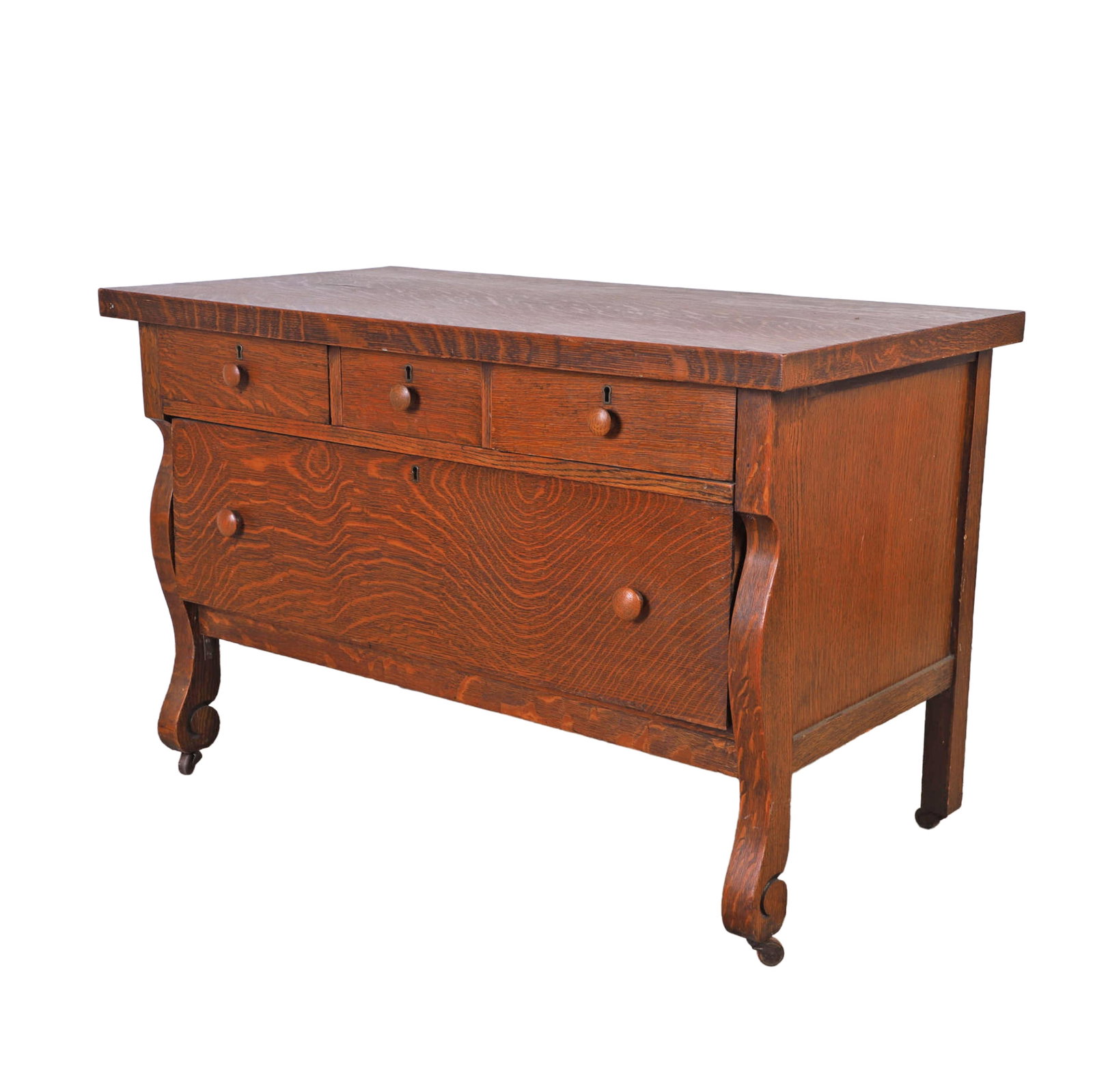 American Oak Washstand: American Oak Washstand American oak washstand, three drawers over one long drawer, scrolled legs with casters, Late 19th-20th C., 27"h x 42"w x 20" d