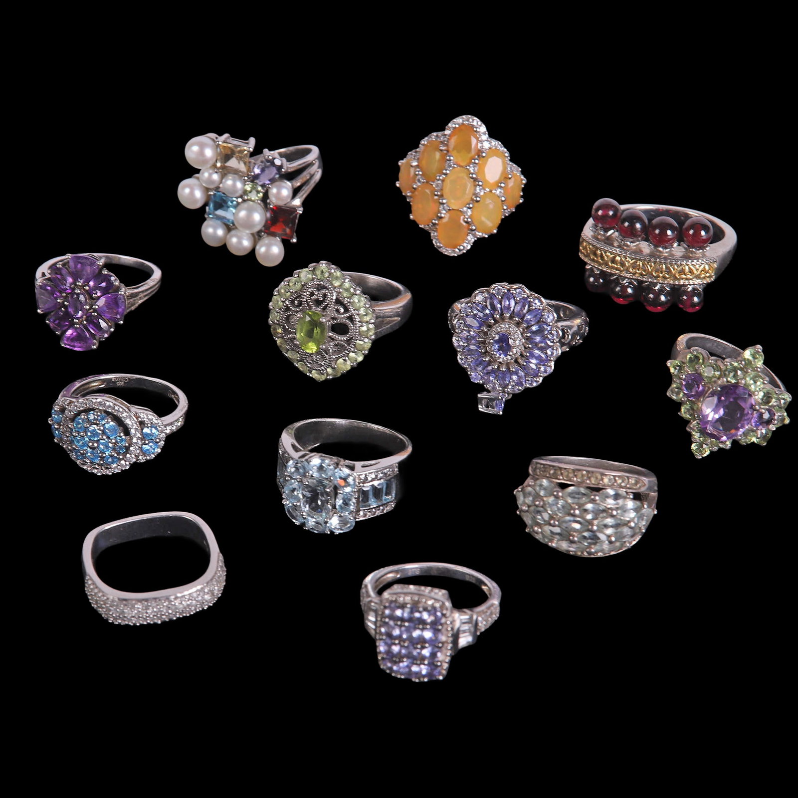 (12) Sterling Silver & Fashion Rings: (12) Sterling Silver & Fashion Rings (14) Sterling Silver & Fashion Rings to include tanzanite floral cluster ring marked STS 925, sterling silver dome ring with marquise cut pale green stone marked H