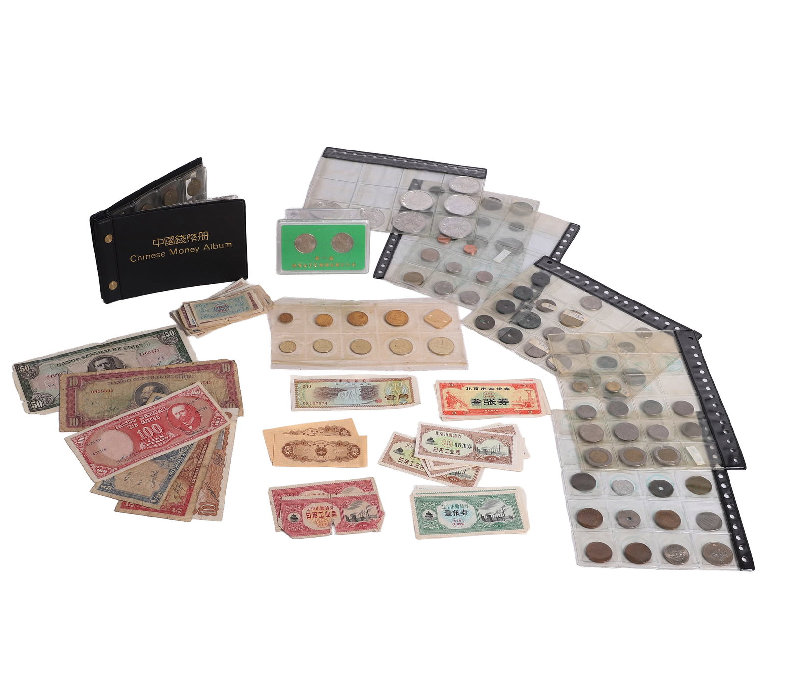 Foreign Currency Lot: Foreign Currency Lot Mixed lot of bills, coins and tokens featuring Chinese currency as well as Russian, Filipino, Chilean, Japanese, American & more.