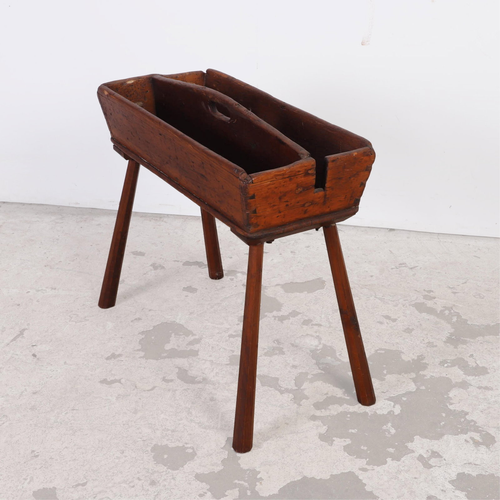 Primitive Pine Farrier's Caddy. 19th C., American: Primitive Pine Farrier's Caddy. 19th C., American A 2 channel dovetailed caddy on later legs. 26" H x 28" W x 14" W (at base of legs.)