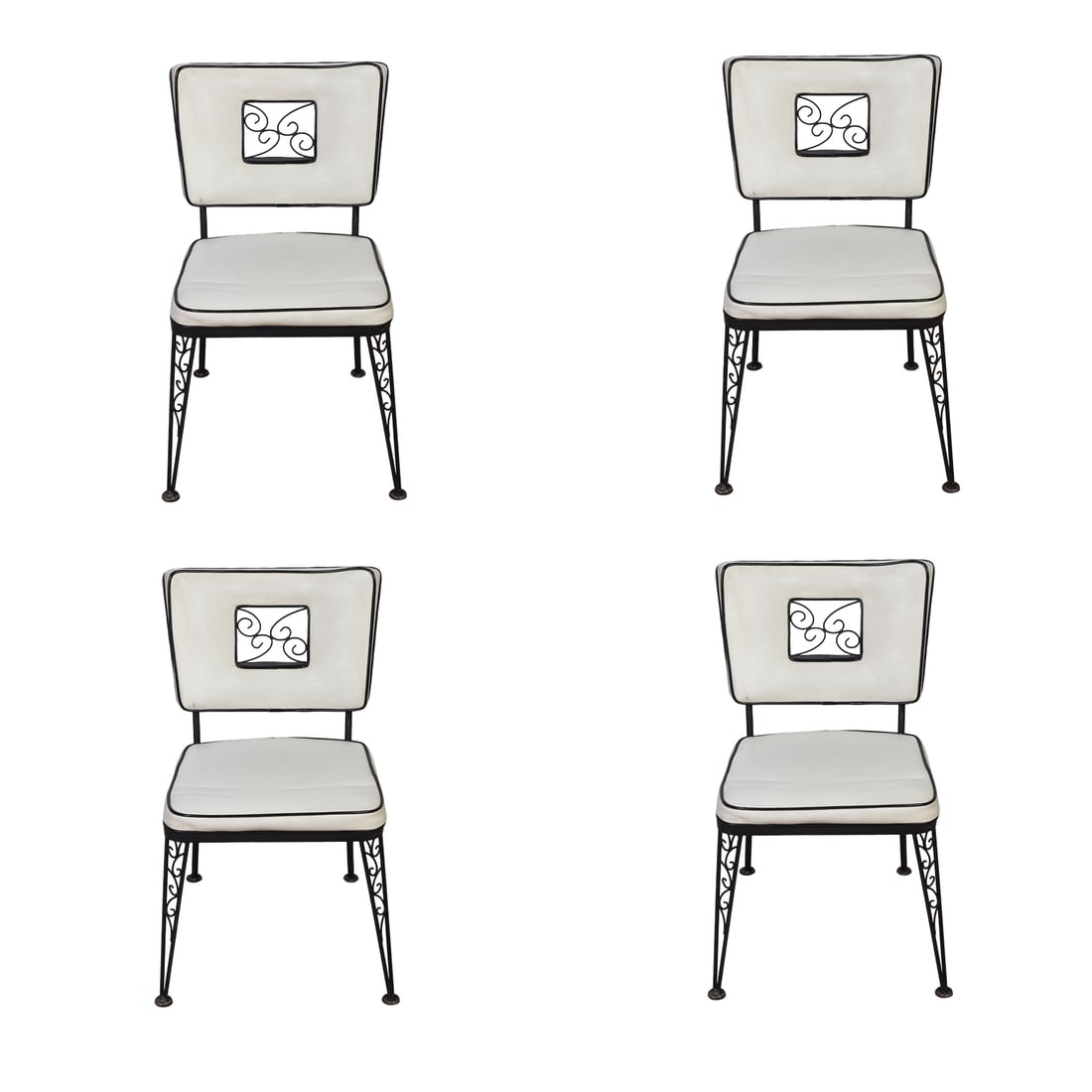 (4) Woodard Skyline Style Dinette Patio Chairs: (4) Woodard Skyline Style Dinette Patio Chairs Vinyl upholstered over wrought iron frames with inset flourish design on back splat. Size: 31.5" H x 20" W x 22" D.