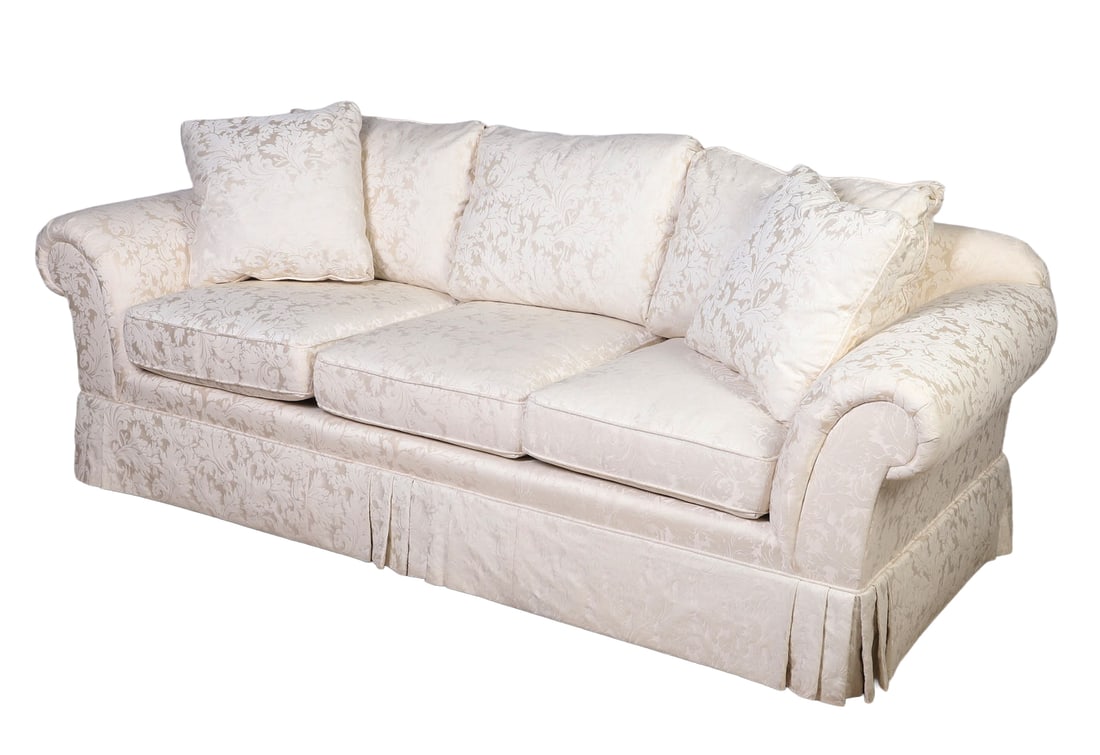Brocade Upholstered Rolled Arm Sofa: Brocade Upholstered Rolled Arm Sofa Labeled Century. Brilliant satin brocade. Pleated skirt. Size: 28" H x 86" W x 35" D