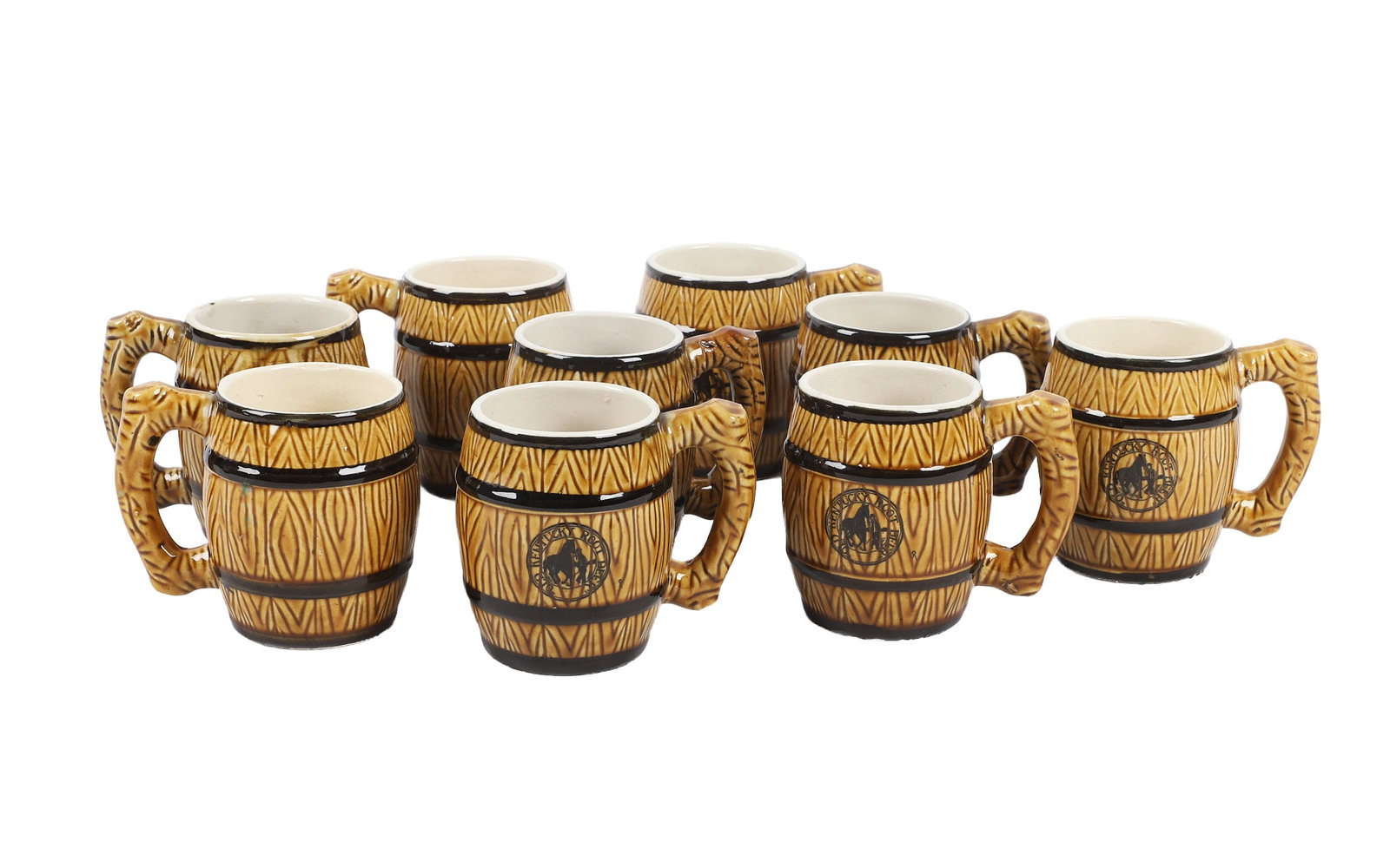 (9) Ceramic Japanese 'Old Kentucky Root Beer' Barrel Mugs: (9) Ceramic Japanese 'Old Kentucky Root Beer' Barrel Mugs Set of (9) 'Old Kentucky Root Beer' ceramic barrel mugs measuring 4 1/2"l x 3 3/4"h, made in Japan, no chips/cracks noted.