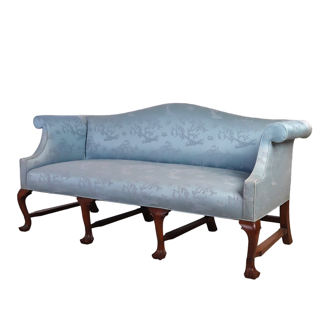 Chippendale Camelback Sofa: Chippendale Camelback Sofa Upholstered in a C hinoiserie satin brocade. Heavy carved wood frame. 36" H x 72" W x 28" D