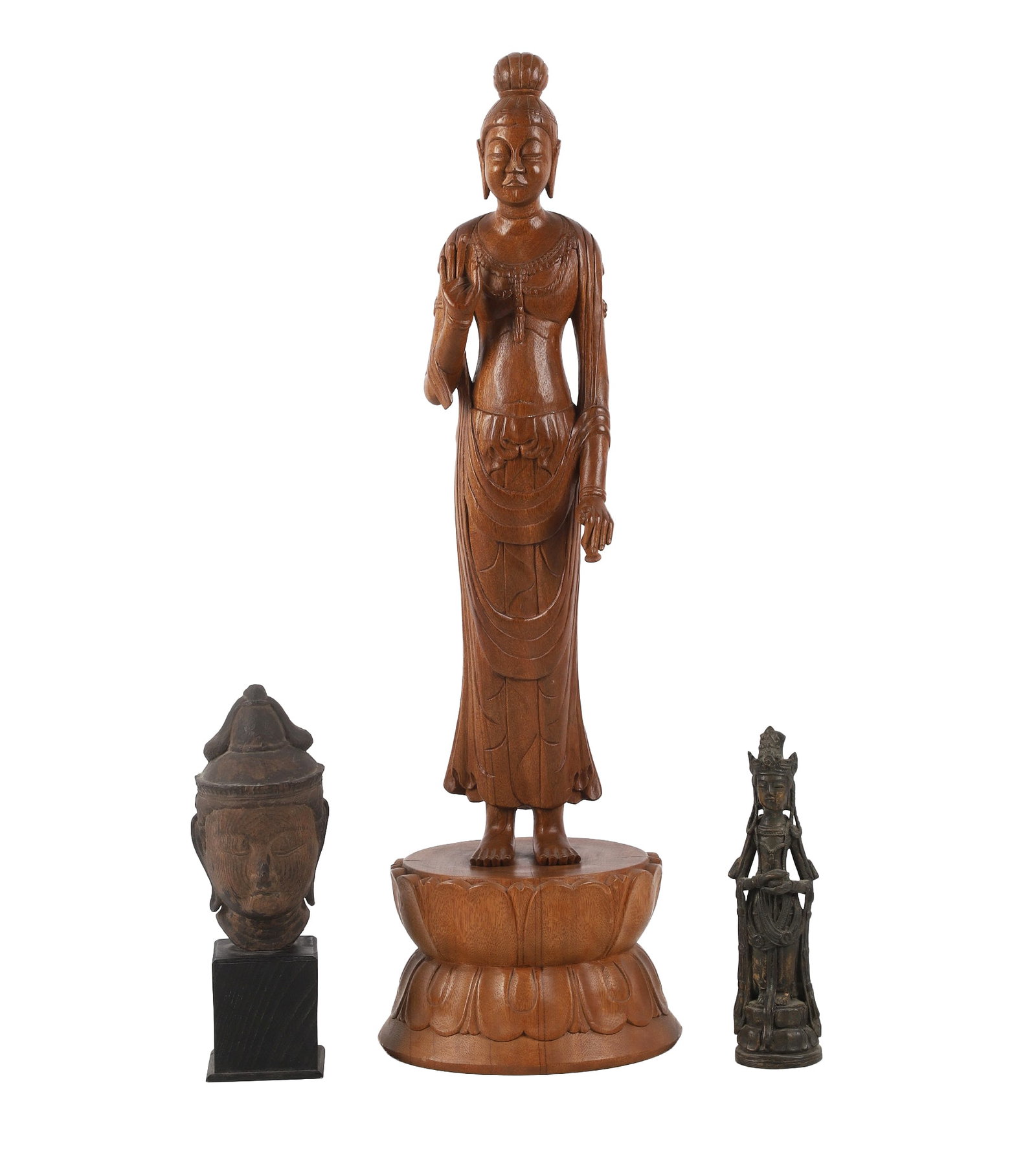 (3) Guanyin Boddhisattva Figures: (3) Guanyin Boddhisattva Figures An endearing group consisting of a modern 27.5" high carved teak figure, a 9" high cast metal Sino Tibetan figure, and a carved cryptomeria portrait bust with age.
