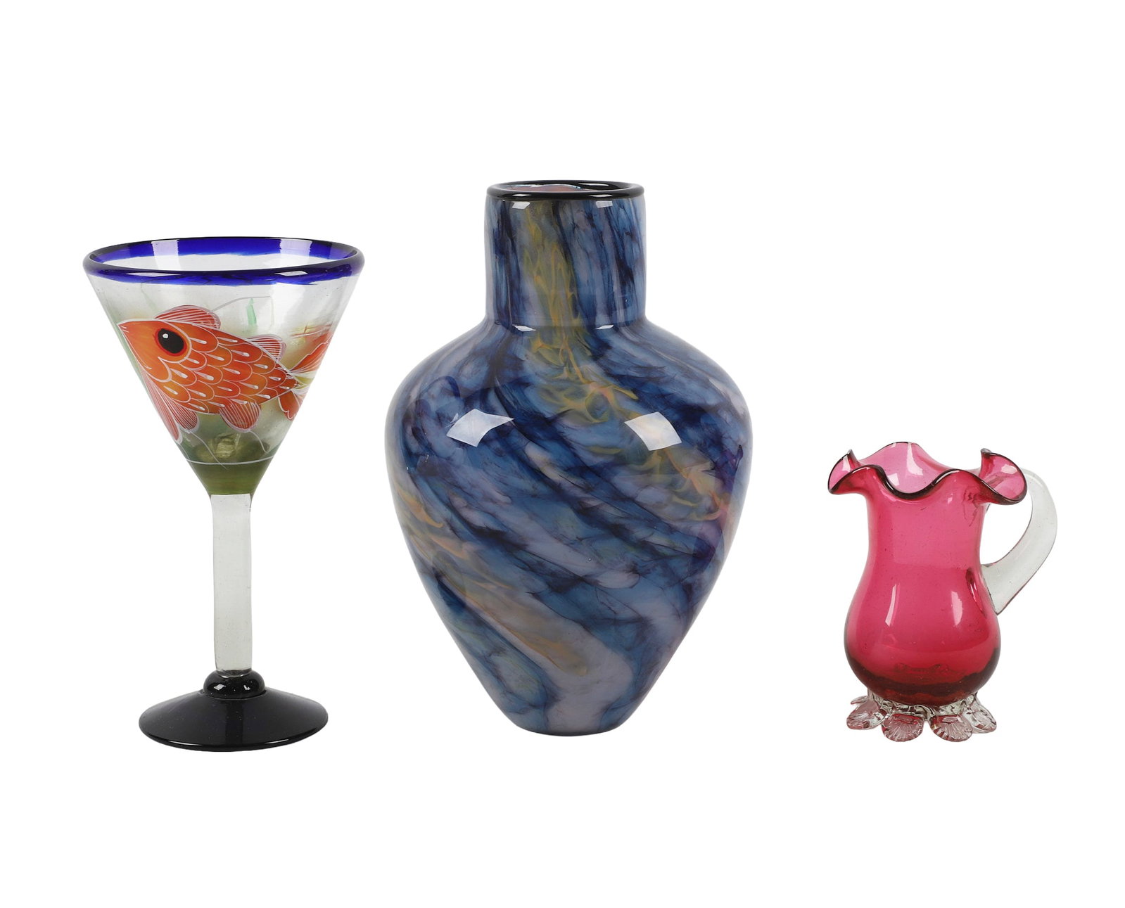 (3) pieces of Art Glass: (3) pieces of Art Glass (3) Art glass pieces to include: 1) blue/green swirl glass vase, 9 1/4"H. 2) a Mexican hand painted fish martini glass, 8"H. 3) a cranberry glass creamer with ruffled rim and b