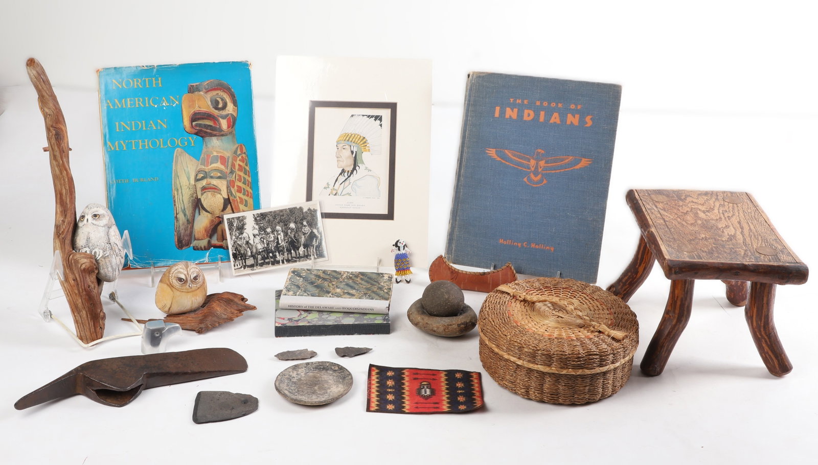 Native American Themed Items, Books. Etc.: Native American Themed Items, Books. Etc. Native American Themed Items, Books. Etc. to include a woven lidded basket, miniature bark canoe, cigar felt, 5 1/2"L x 3 5/8"W, (2) stone arrow heads, Zuni