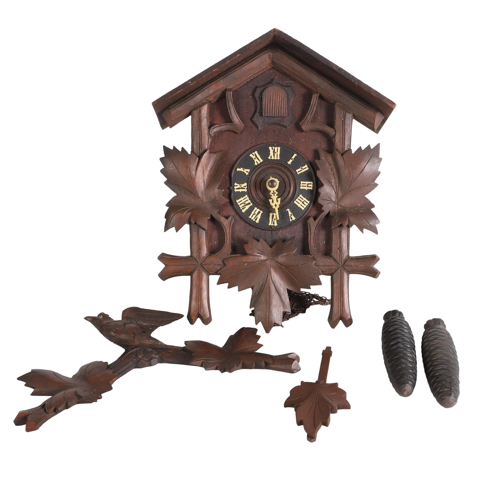 Black Forest Cuckoo Clock, For Repair: Black Forest Cuckoo Clock, For Repair German Black Forest cuckoo clock with unattached decorative roof facade and missing minute hand, untested.17"H x 13"W x 7 1/2"D when assembled, not including