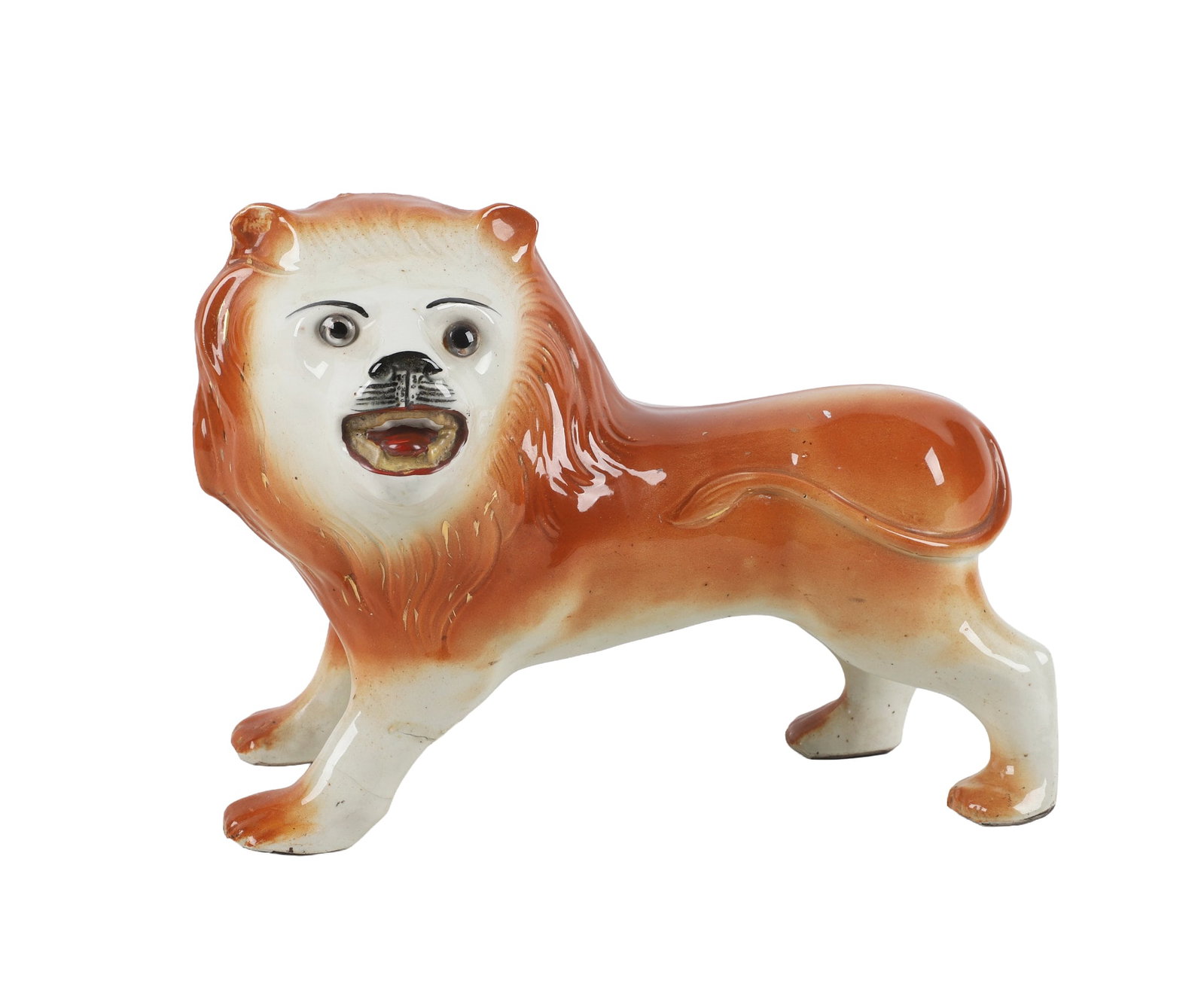 Staffordshire Porcelain Figure of a Lion.: Staffordshire Porcelain Figure of a Lion. Antique English Staffordshire porcelain statue of a standing lion with distinct glass eyes, 13"L x 6"W x 9 1/2"H. (several hairline cracks, repair at the fron