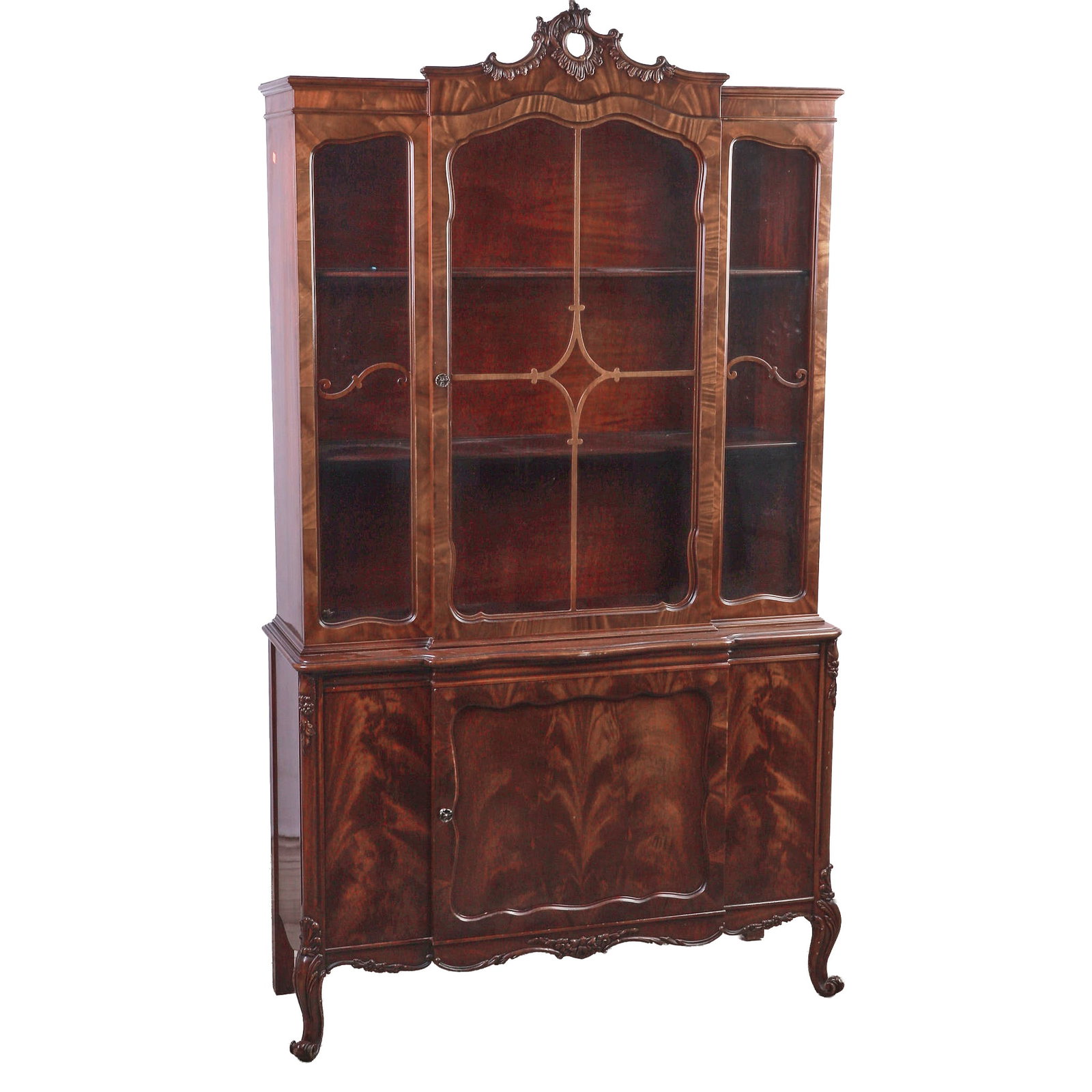 French Louis XV Style Bookcase or China Cabinet, 20th C.: French Louis XV Style Bookcase or China Cabinet, 20th C. A mahogany-finish vitrine style case with single-door over a single paneled door case with scalloped apron and supported by carved cabriole fro