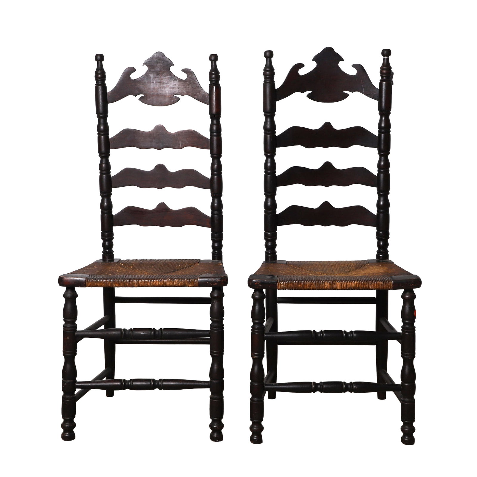 Pair of French Country Ladderback Chairs, 19th C.: Pair of French Country Ladderback Chairs, 19th C. Pair of rush seat chairs on turned legs and box stretcher with shaped ladder backsplats. 43" H x 18" W x 18" D