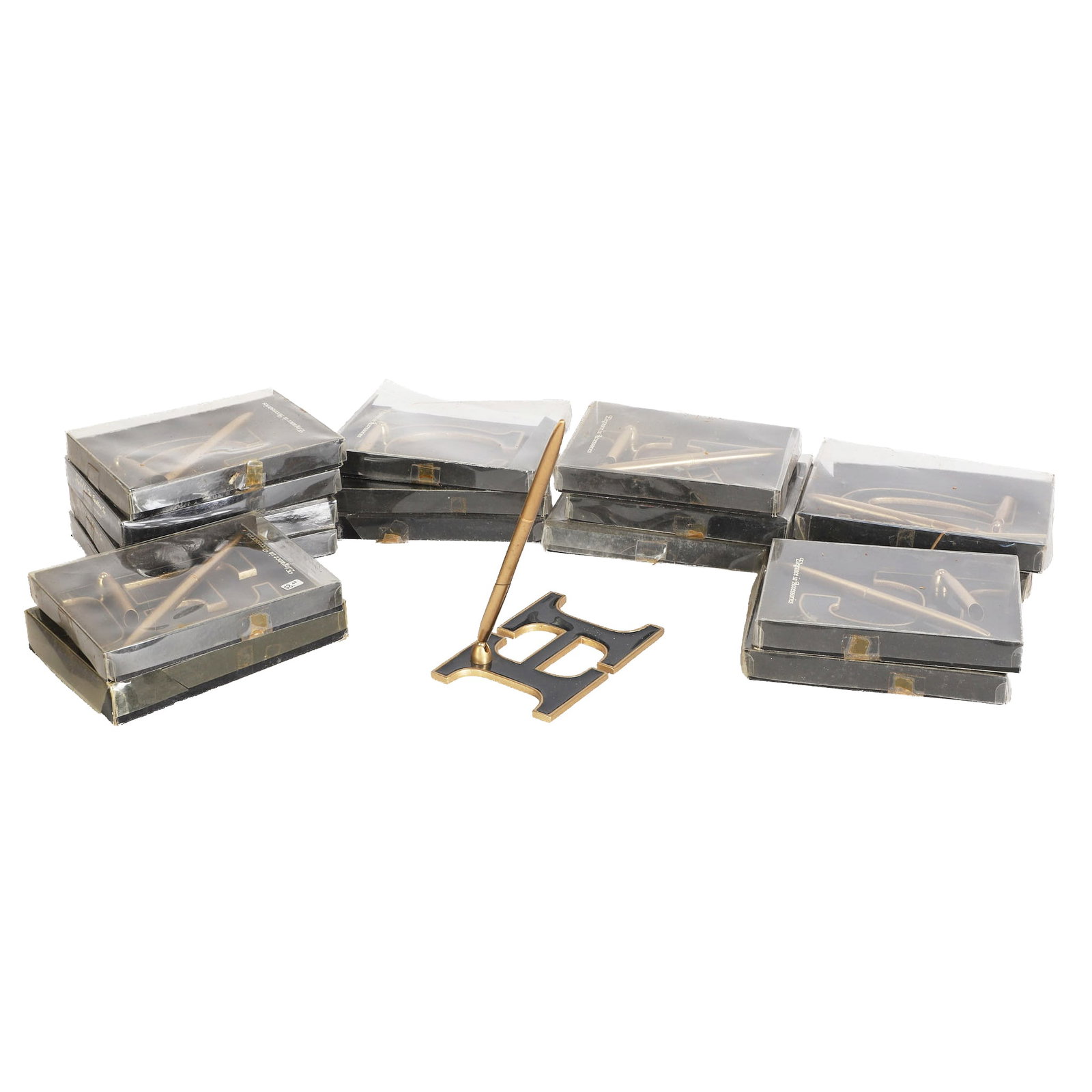 (17) NOS Lettered Pen Stands: (17) NOS Lettered Pen Stands (17) NOS pen stands with alphabetically lettered bases. Boxes show varying degrees of wear, each 4 1/2" x 5 3/4"